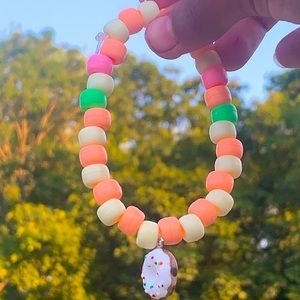 Has donut charm multi colored